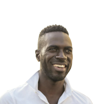 A man smiling wearing a white shirt